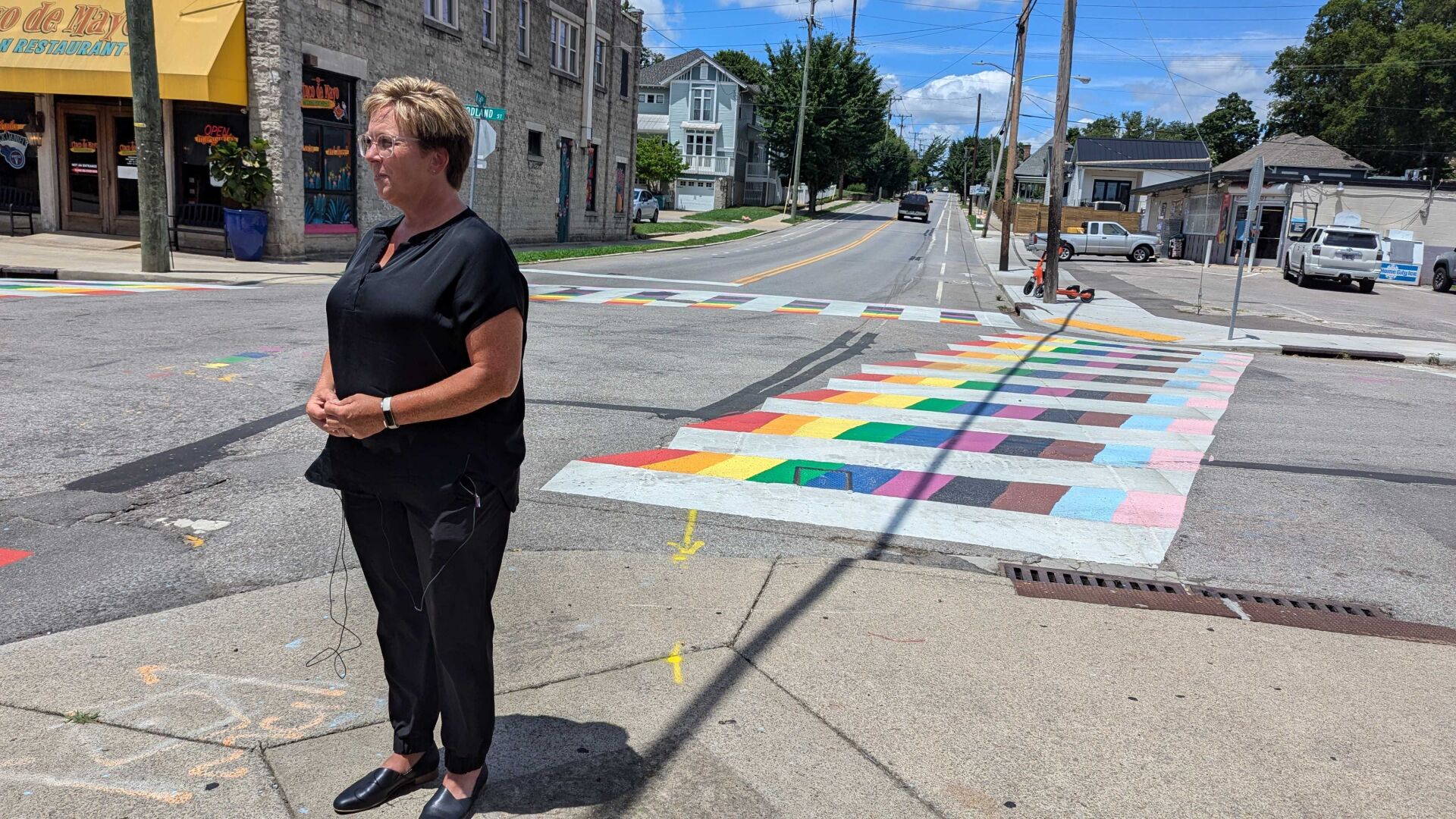 Emily Benedict at the rainbow crosswalk outside Lipstick Lounge